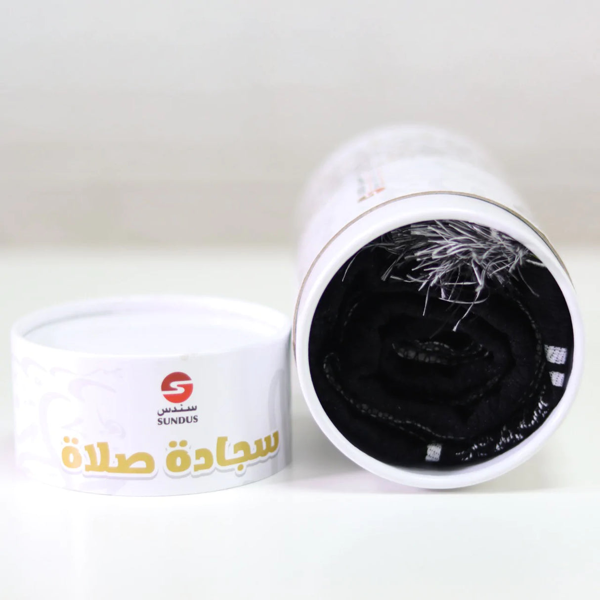 سجادة المدينة في علبة اسطوانية هدايا الحج