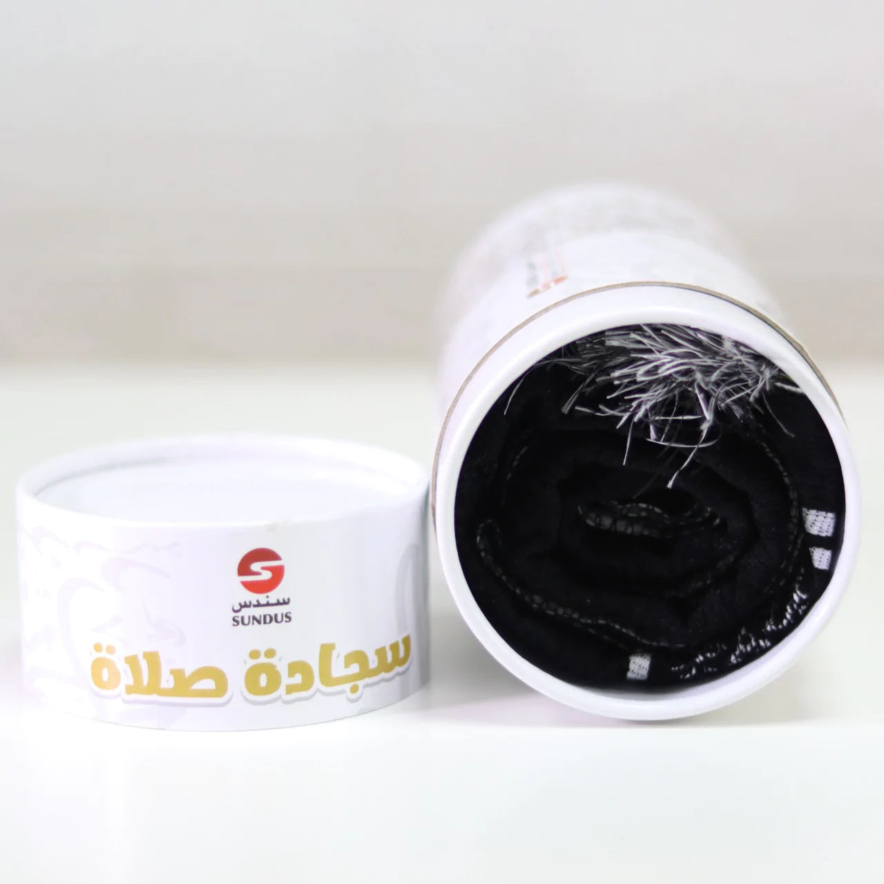 سجادة المدينة في علبة اسطوانية هدايا الحج 